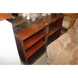 A low mahogany open fronted bookcase