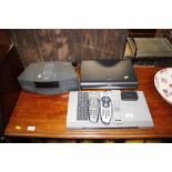 A Bose Wave radio/CD; a Sky box; DVD player (all w