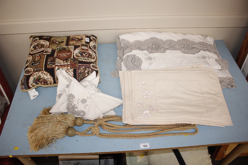 A quantity of assorted linen, table cloths, curtai