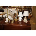 A collection of various table lamps
