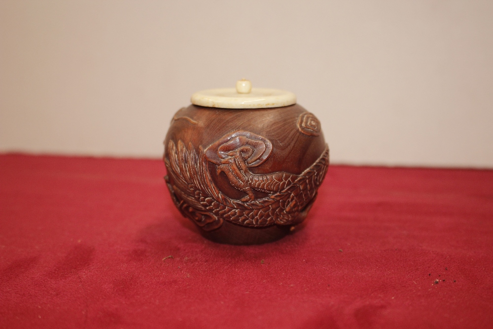 An oriental carved wooden jar with bone cover, of - Image 2 of 3