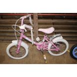 A Sunbeam pink child's cycle