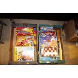 Two boxes of miscellaneous games to include Magnet