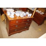 An Edwardian chest of two short and two long drawe
