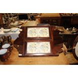 An Edwardian hanging corner cupboard with tile ins