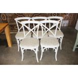 A set of four white painted cross back bentwood ch