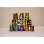 Twelve cloisonné thimbles