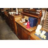 A Victorian mahogany chiffonier with raised mirror