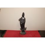 A carved hardwood figure of "Guanyin"