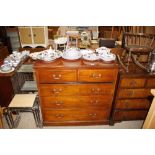 An Edwardian mahogany chest of two short and three