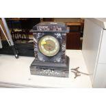 A Victorian marble cased mantel clock