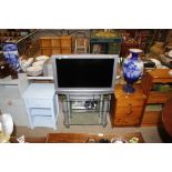 A Sony flat screen television / DVD player / and t