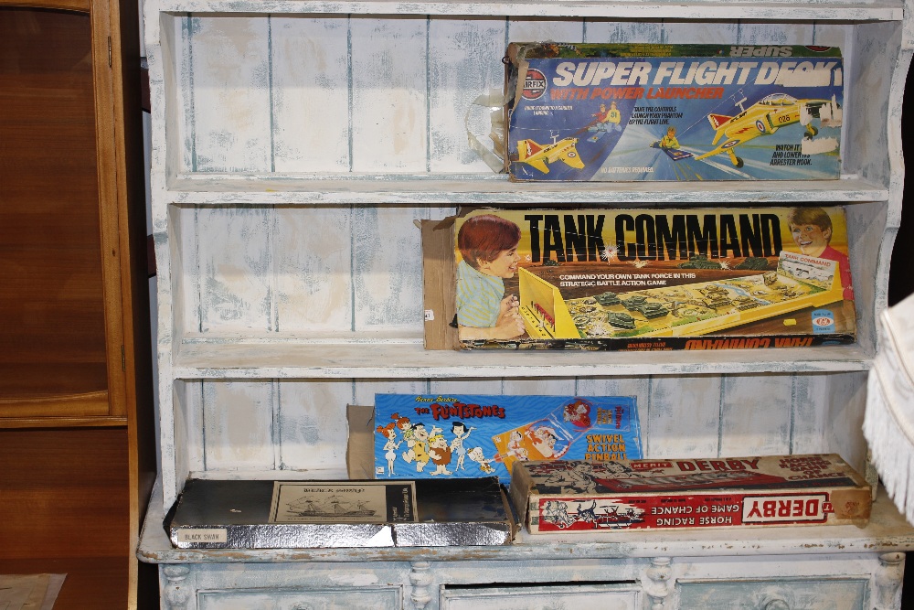 A box of large games including Airfix Super Flight