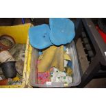 A plastic crate of rock climbing equipment