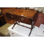 A reproduction mahogany sofa type coffee table