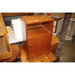 A teak bedside cabinet