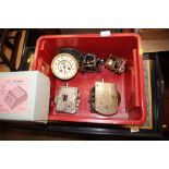 A box containing gramophone motors, clock mechanis