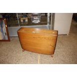 A light Ercol drop leaf coffee table