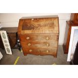 A Georgian mahogany and cross banded bureau fitted