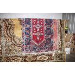 An Eastern floral pattern rug on predominately blu