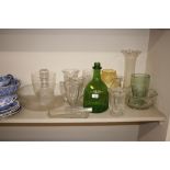 A collection of various glassware to include vases