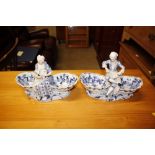 A pair of Meissen blue and white figural salts - r