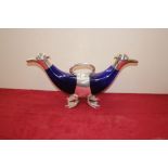 A blue glass and silver plated mounted double duck