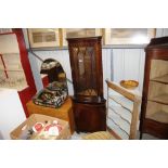 A reproduction mahogany corner cabinet