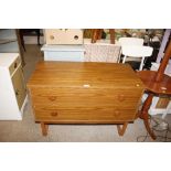 A teak effect two drawer chest