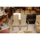 A set of eight wicker conservatory dining chairs -