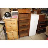 A 1930's light oak open fronted bookcase