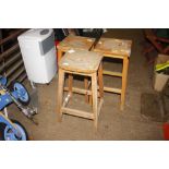 Three wooden high stools