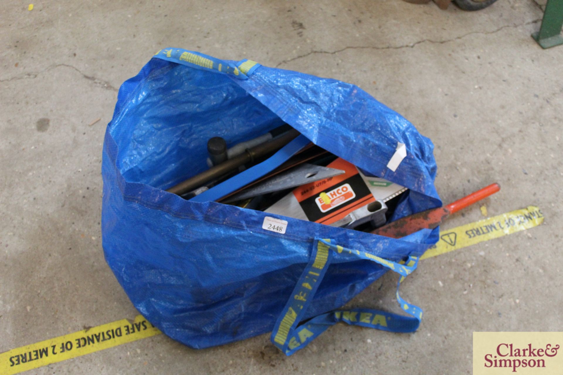 Tool bag containing various saws, squares etc.