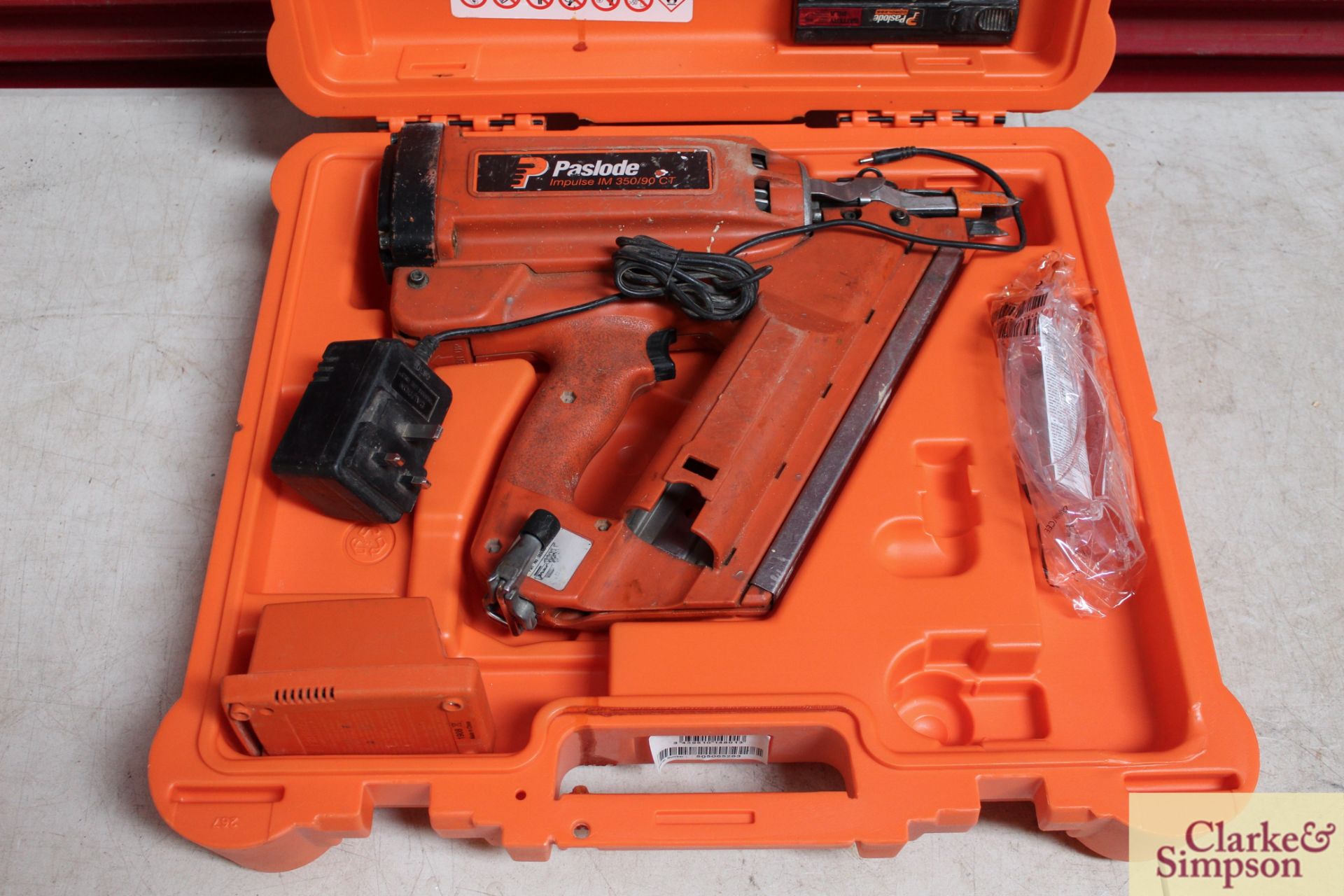 Paslode Impluse IM 350/90 CT nail gun with two batteries and charger in case. - Image 2 of 4