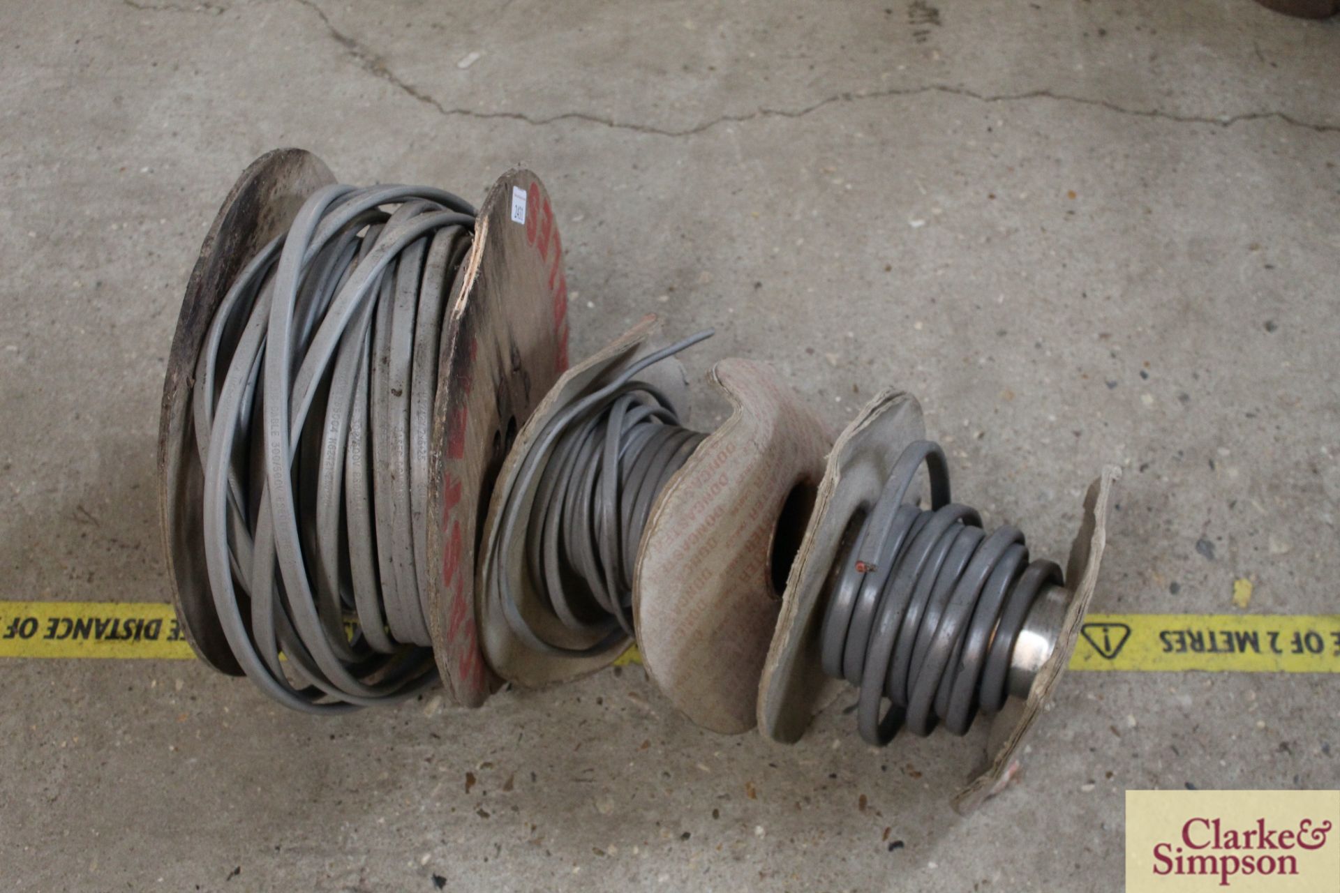 3x rolls containing electric cable.