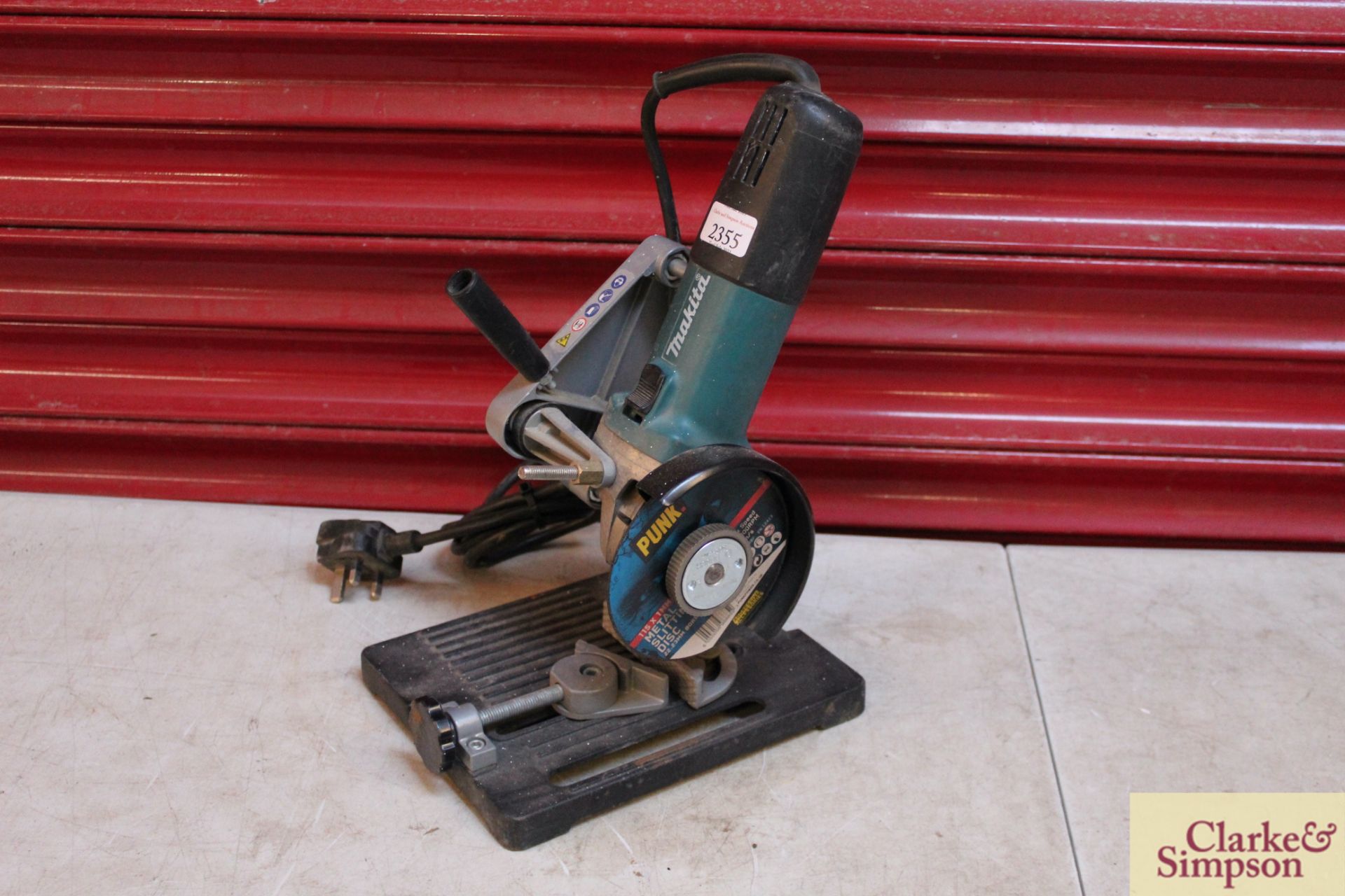 Makita 9557NB 240V 4½" grinder with chop saw stand.