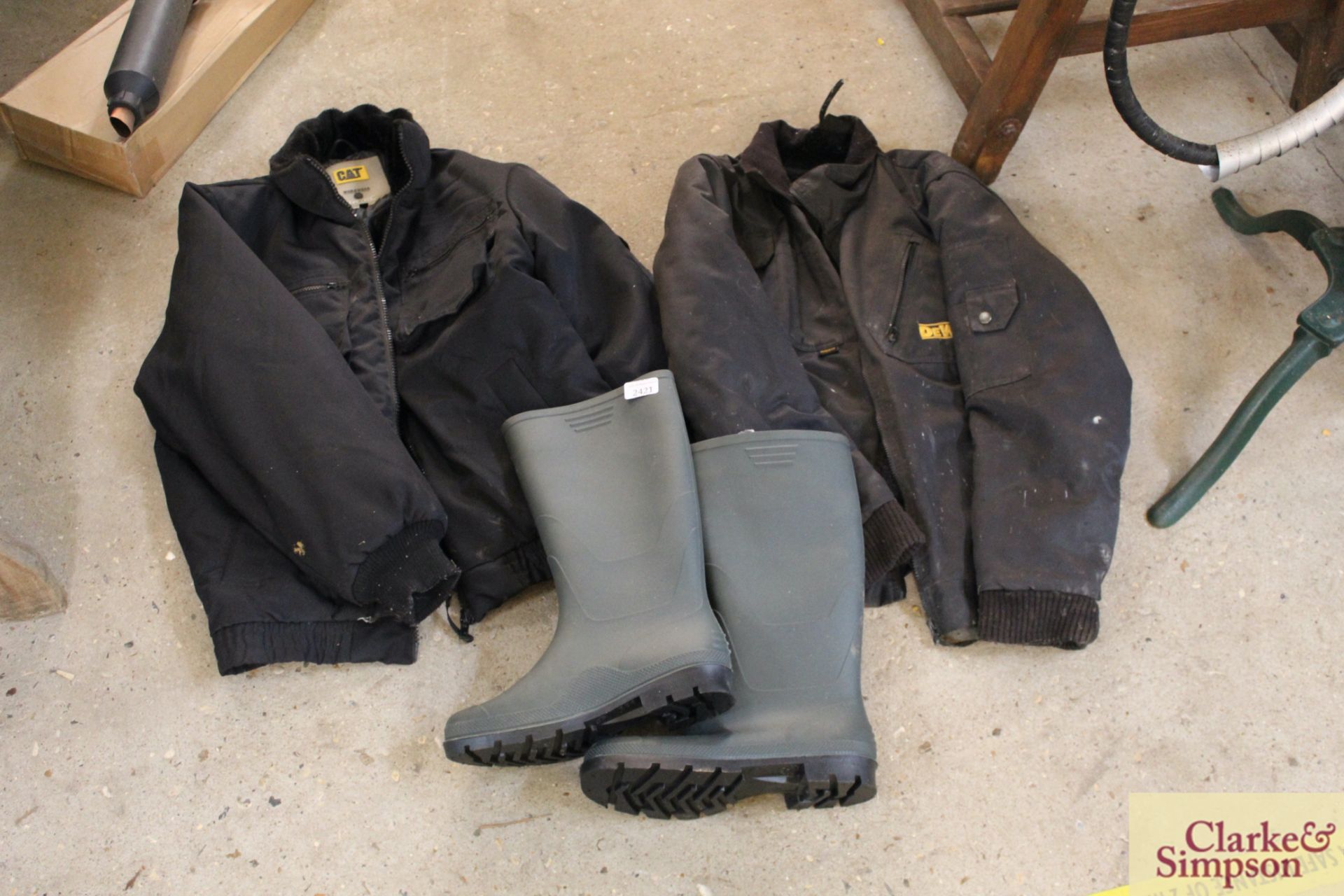 Pair of size 9 Wellingtons; a medium CAT work coat