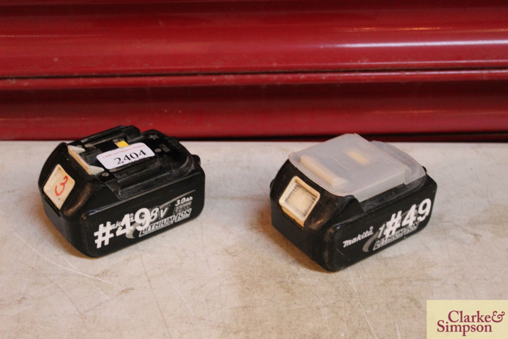 2x Makita 18V batteries.