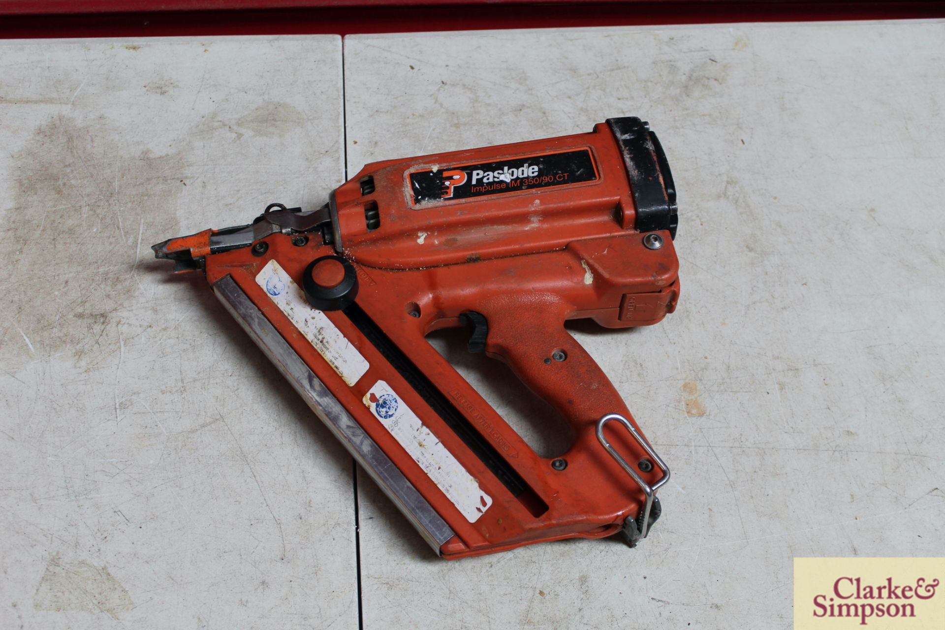 Paslode Impluse IM 350/90 CT nail gun with two batteries and charger in case. - Image 4 of 4