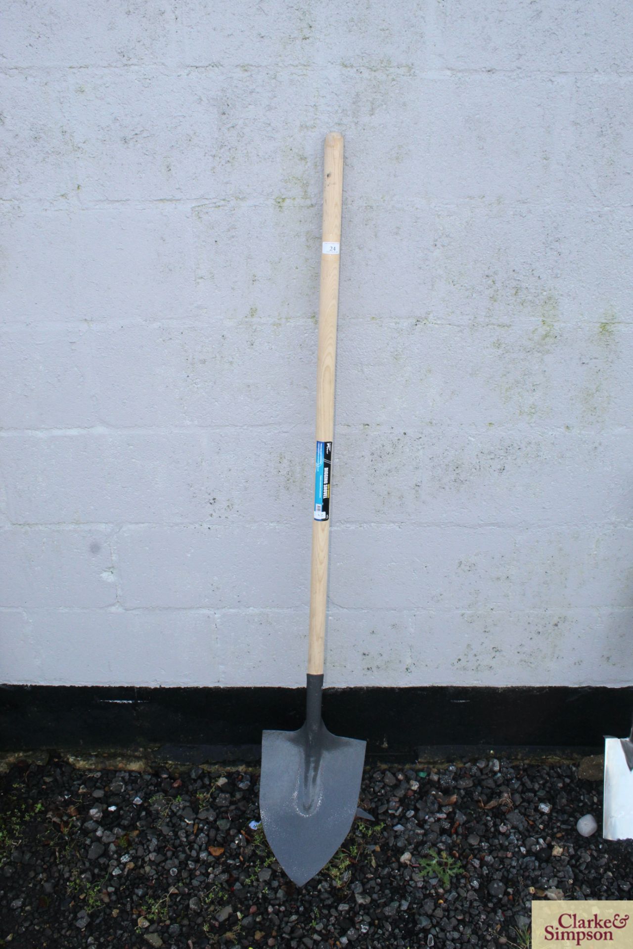 Long handled digging shovel.*