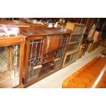 A 1930's oak side-by-side bureau bookcase