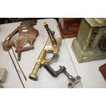 A vintage heavy brass counter top corkscrew