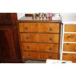 A walnut chest of four drawers