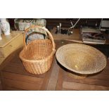 A wicker basket and a wickerwork jardinière