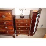 A mahogany effect hi-fi cabinet with lifting top a