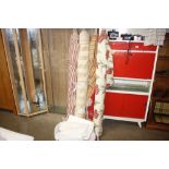 Various rolls of fabric etc