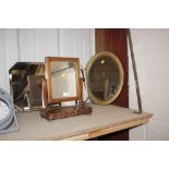 A Victorian swing toilet mirror; an oval gilt fram