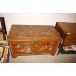 A Chinese carved camphor wood chest