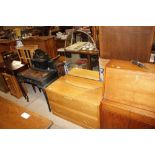 An Art Deco light oak dressing table