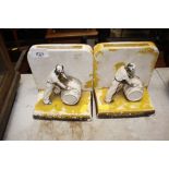 A pair of decorative Golden Spirit bookends